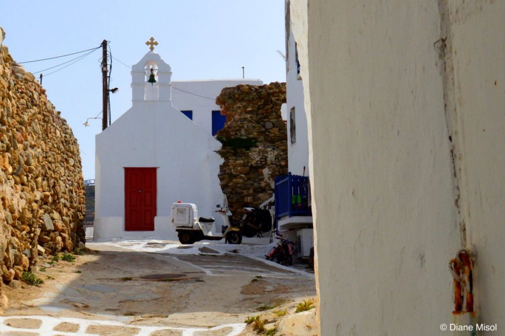Little Church and Bell Tower Down the Lane. Mykonos, Greece