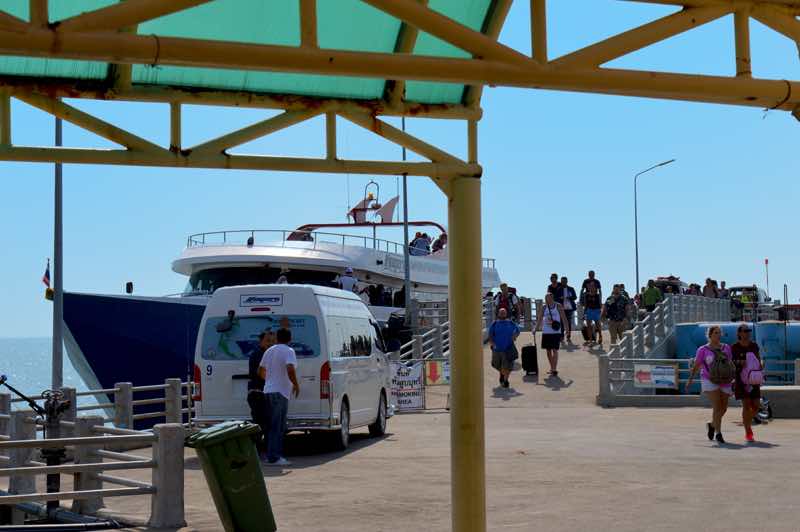 A Ferry Arrives at the Surat Thani Pier - Thailand