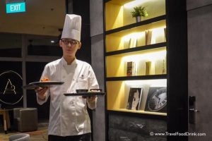 Chef Bringing Dinner - Aerotel Singapore