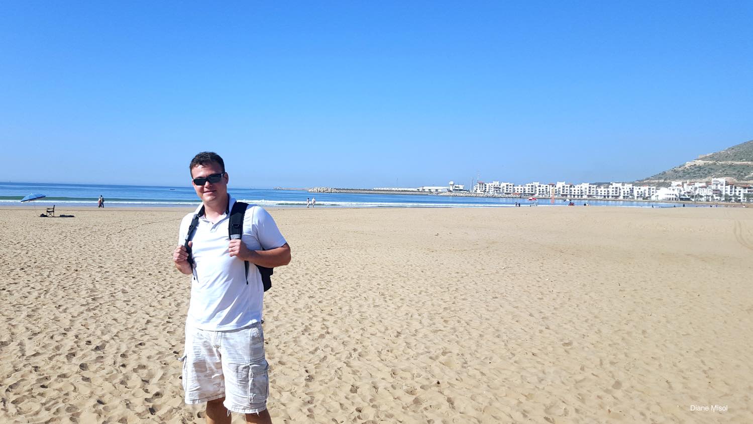 Tourist checking out Agadir Beach, Morocco