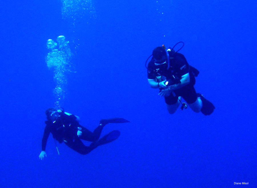 two divers in Maldives blue water
