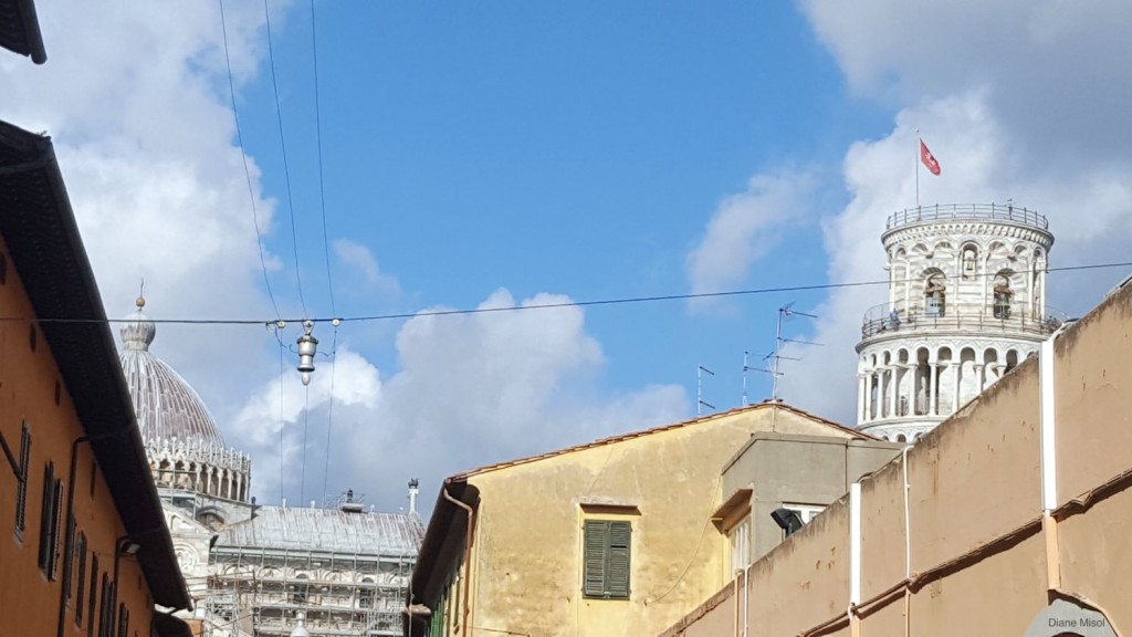 Tower Peaking Over the Rooftops, Pisa, Italy