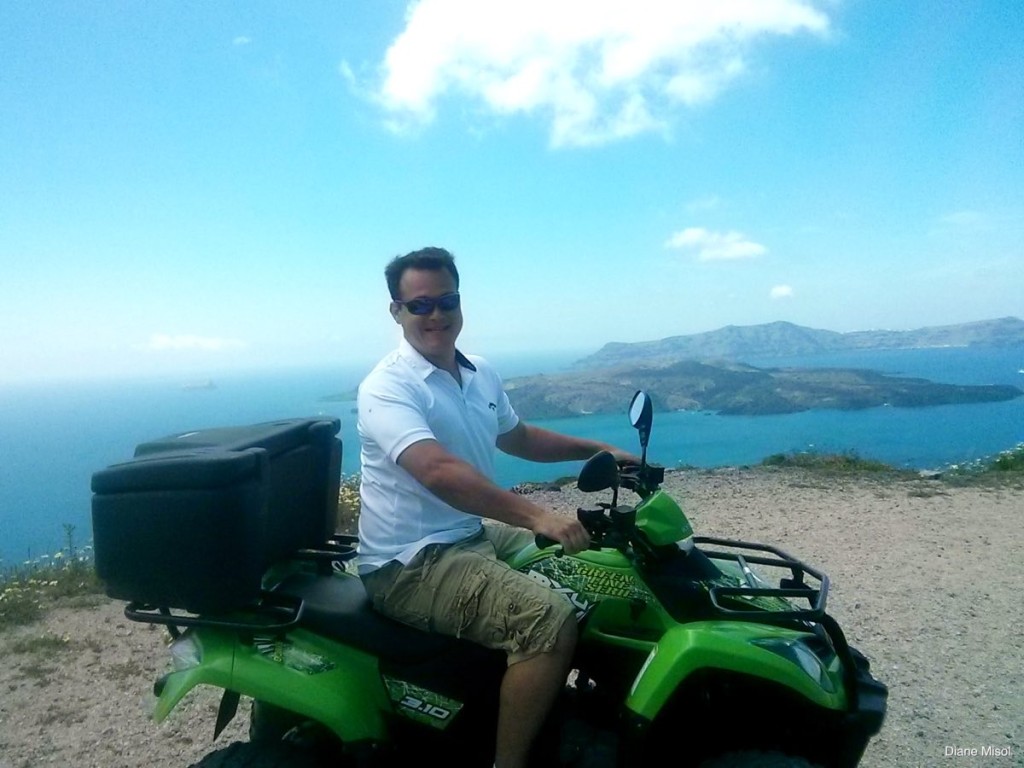 Man on ATV, Santorini, Greece