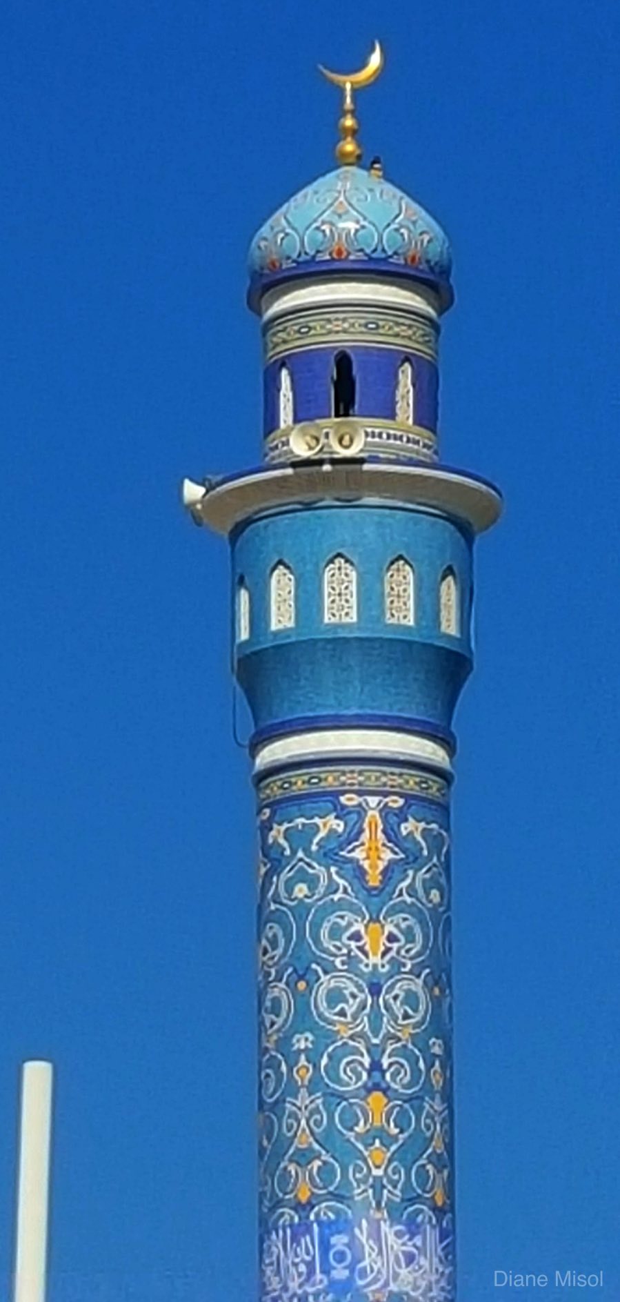 Beautiful coloured Mosque Tower. Muscat, Oman