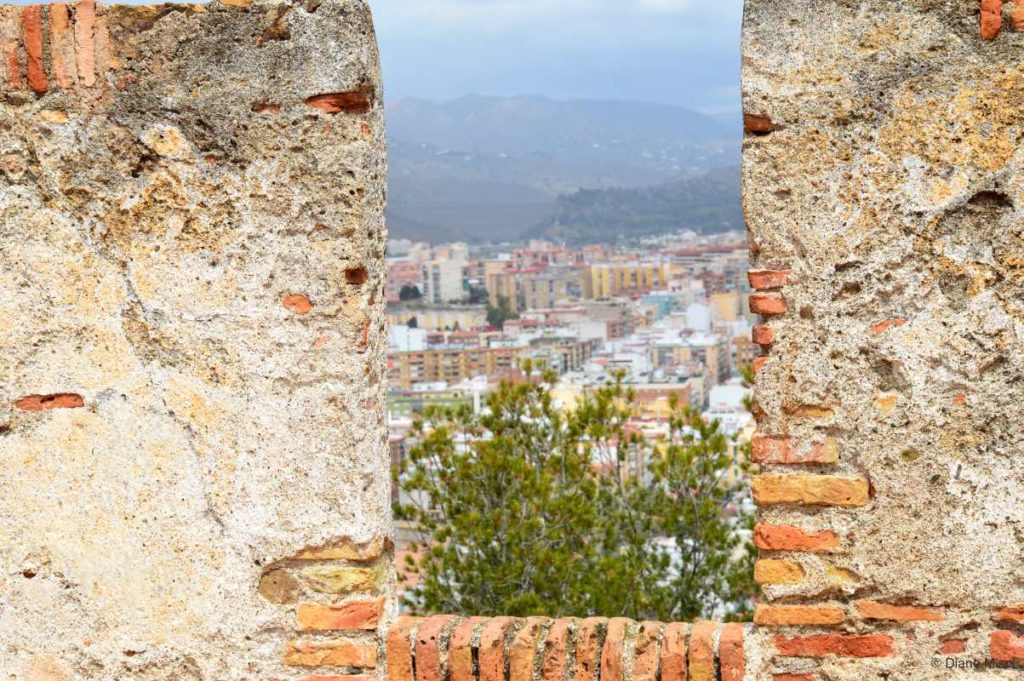 Peaking through Fortress Walls. Malaga, Spain