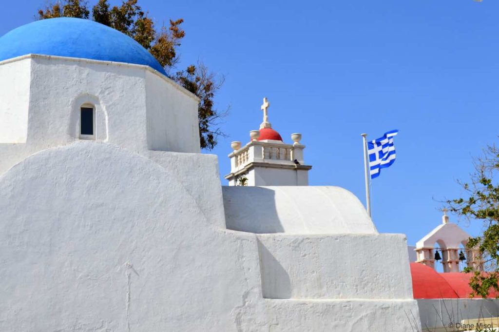 Greek Flag, Crosses and Bells. Mykonos, Greece