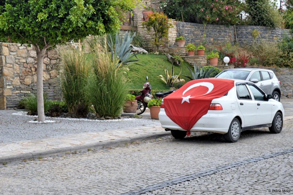 Car draped with Turkish Flag
