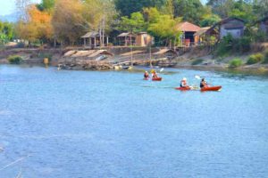 Kayakers on Nam Song River - Vang Vieng, Laos