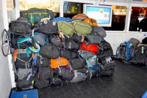 Backpacks Loaded at the Front of Lompraya Boat, Inside - Thailand