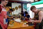 Cooking Students Concentrate on Pounding Curry Paste - Chiang Mai